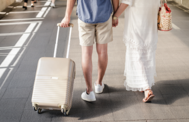 Blog Graphics (25) man and woman walking with suitcase